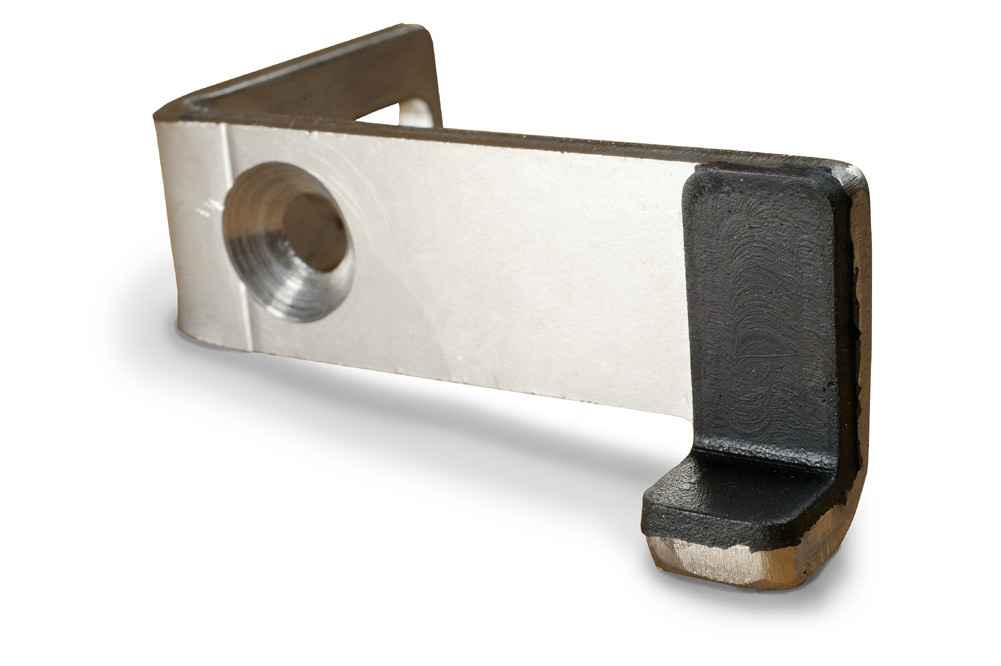 Gummi kan vulkaniseras fast på metaller